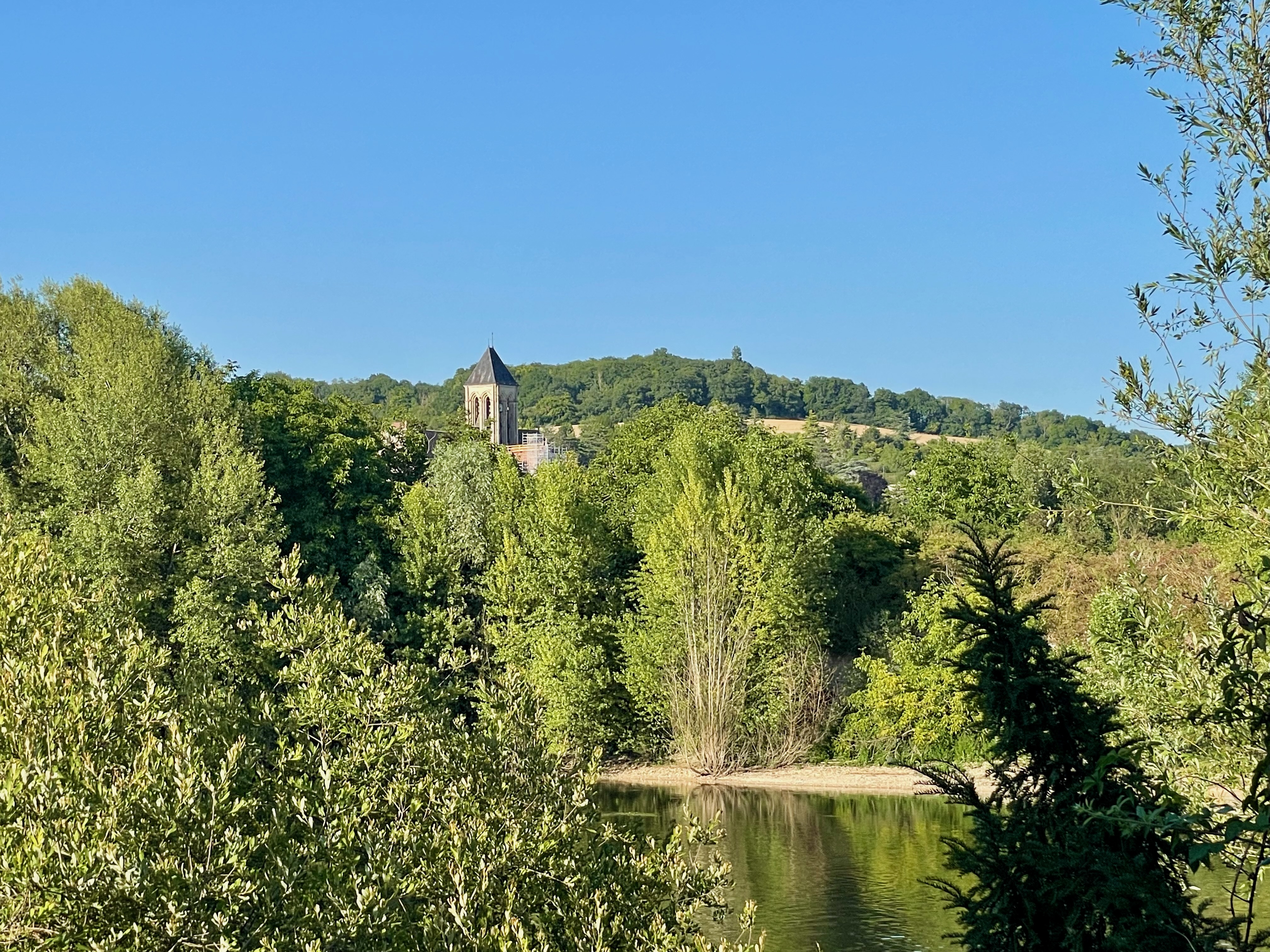 Home At Last Countryside scene with lush green trees and landscape