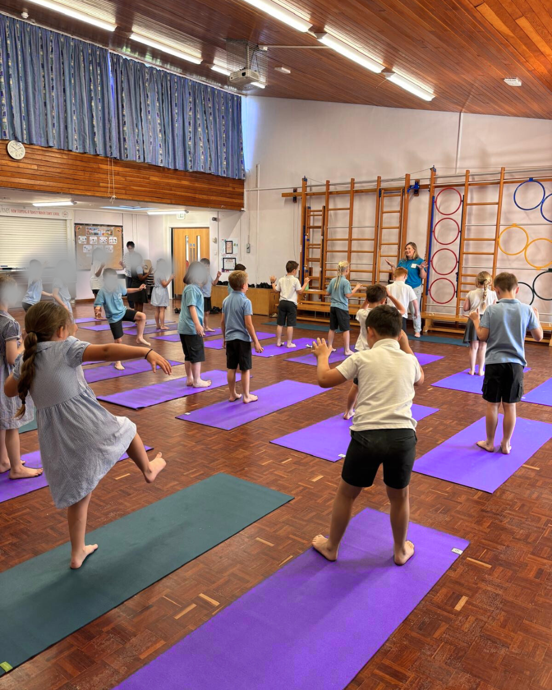 Ramsey Manor Mindfulness Project Partcipants taking part in a warm up game in a school hall