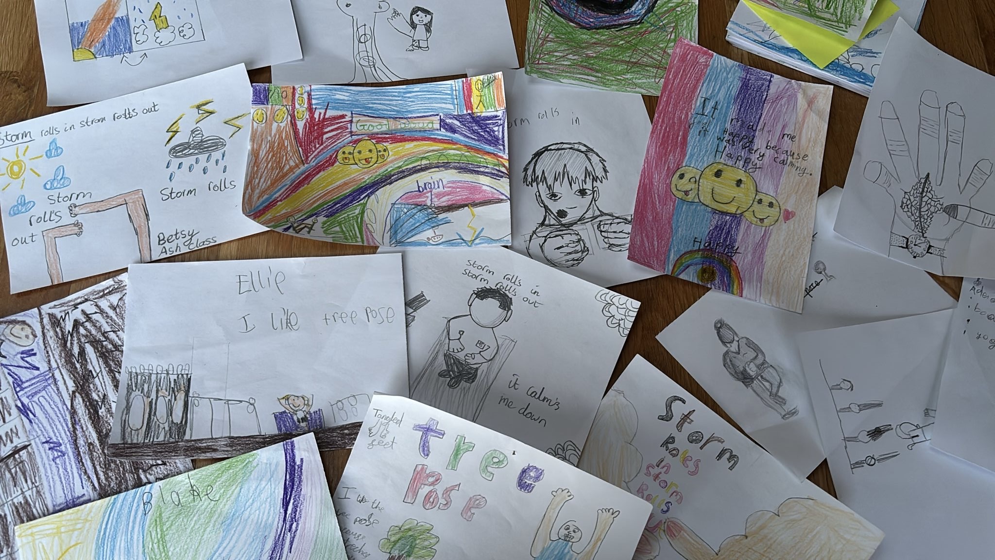 Mindfulness Art Ramsey Manor A photo disaplying all the participants bright and colourful art works with positive messages written on them