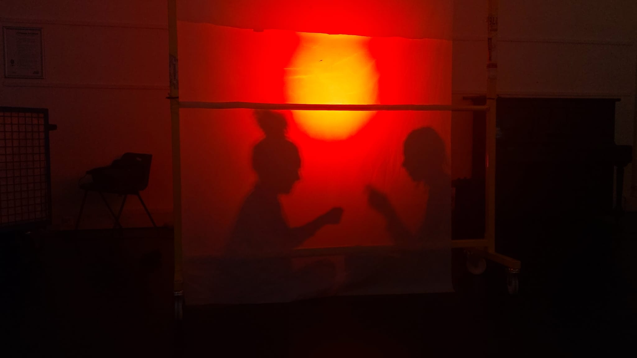 Rehearsal shot of shadow hands