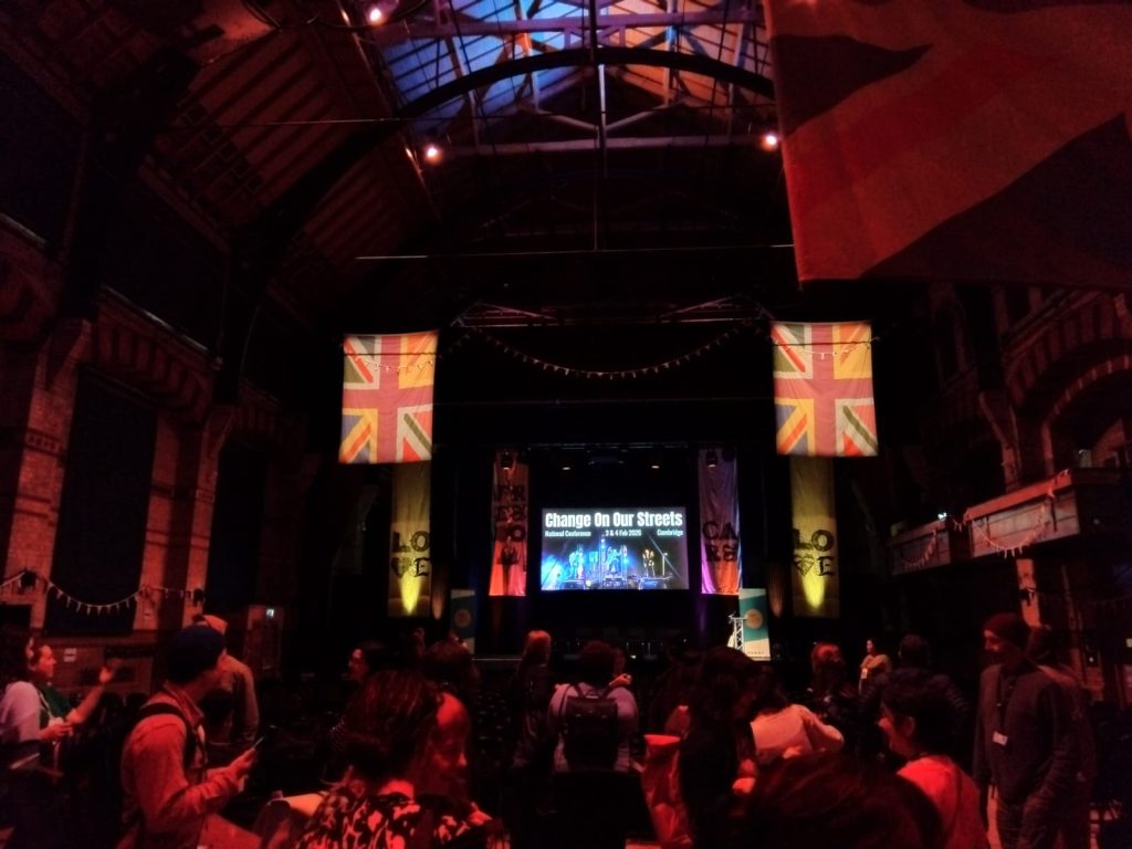 A photo of the inside the auditorium of the outdoor arts conference.